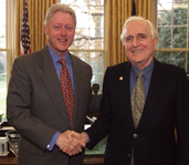 President Clinton congratulating Doug Engelbart